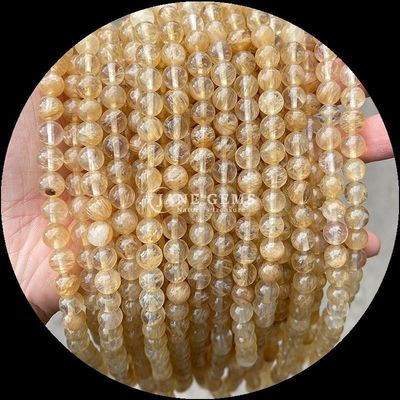 Gepolijste edelstenen ronde snij vuur kwarts Gouden gerutileerde kwarts kraalstrengen voor zelfstandig sieraden maken